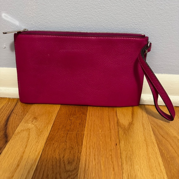 Michael kors clutch Dark pink or Fuchsia clutch has inside pockets for cards. - Picture 2 of 4